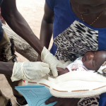 child receiving immunization